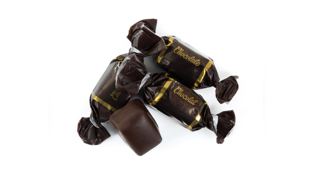 Dark chocolate coating (sugar, cocoa mass, cocoa butter, butter oil (milk), lecithins(emulsifier)), Glucose syrup, Sugar, Palm fat, Condensed skimmed milk, Fat reduced cocoa powder, Sorbitols (humectant), 2% Chocolate (sugar, cocoa mass, cocoa butter, butter oil (milk), lecithins (emulsifier)), Whey powder (milk), Lecithins (emulsifier), Natural flavouring.