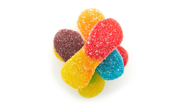 Sugars (sugar, glucose syrup, dextrose), Corn starch, Gelatin, Malic acid, Lactic acid, Citric acid, Sodium malate (acidity regulator), Artificial flavors, Colors [allura red (FD&C Red No. 40), turmeric , brilliant blue FCF(FD&C Blue No. 1)]