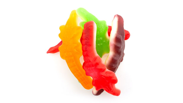Sugars (glucose syrup, sugar), Gelatin, Modified potatoes starch, Citric acid, Lactic acid, Vegetable oil (palm), Beeswax, Carnauba wax, Artificial flavor, Colors [allura red (FD&C Red No. 40), turmeric, brilliant blue FCF (FD&C Blue No. 1)]